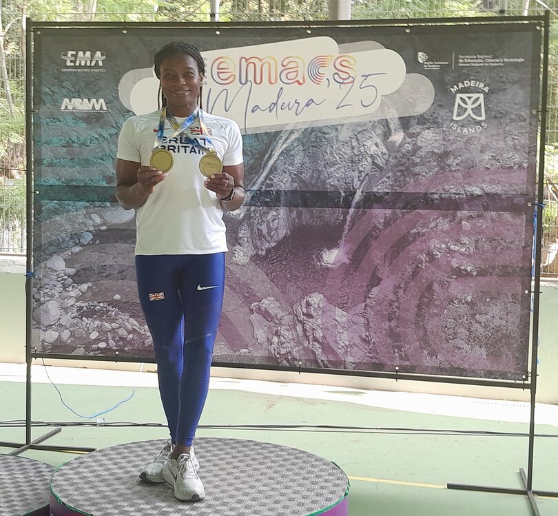 Christine Harrison-Bloomfield W55 with her 100m and 200m gold medals after presentation